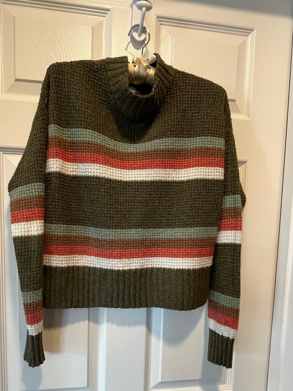 So (Junior’s) Sweater 
Size: Small
Color: Green & multiple colors